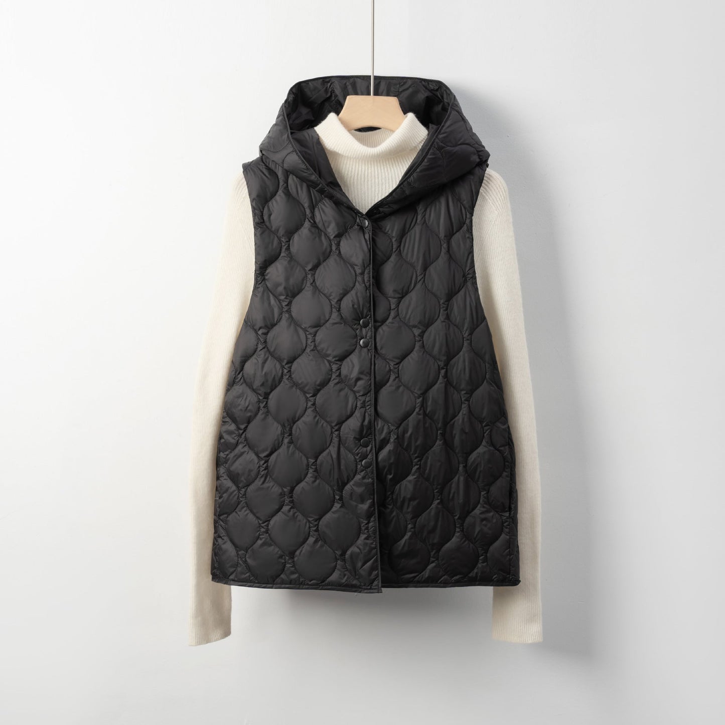 Women's quilted vest with hidden hood and soft lining Berg-Feldt