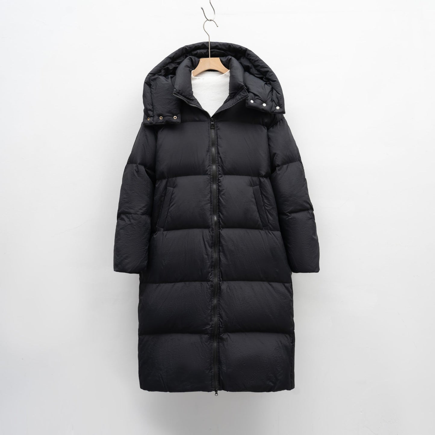 Manteau de duvet long et volumineux pour femme avec capuche amovible et poches latérales Berg-Feldt
