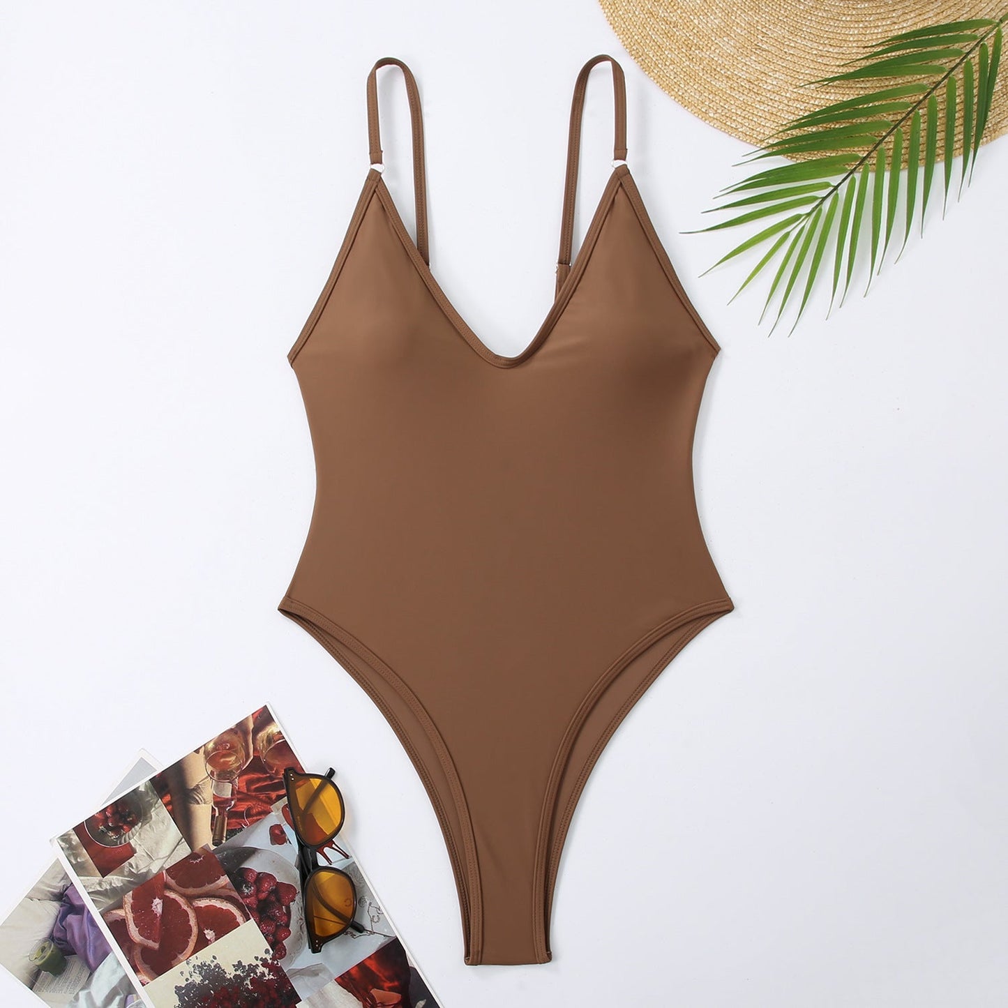 Maillot de bain femme Berg-Feldt avec décolleté en V profond et découpes