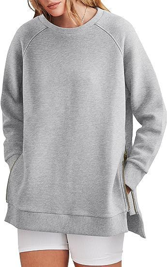 Women's casual sweatshirt with side pockets and zip Berg-Feldt