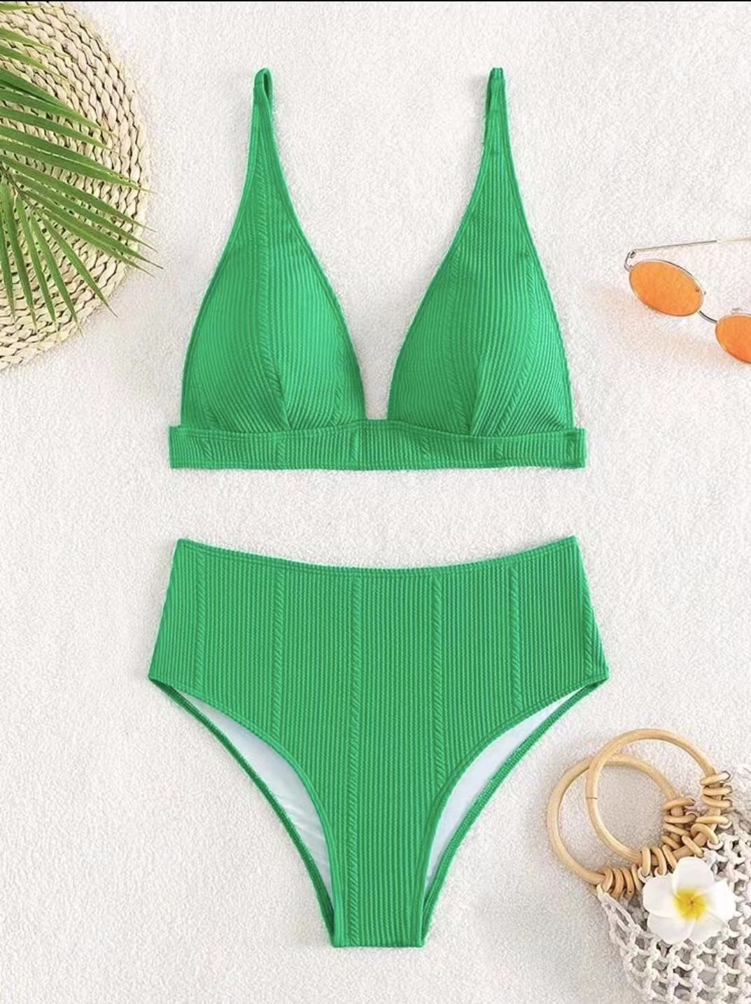 Haut de maillot de bain femme Berg-Feldt à coupe haute, avec surface texturée et fines bretelles