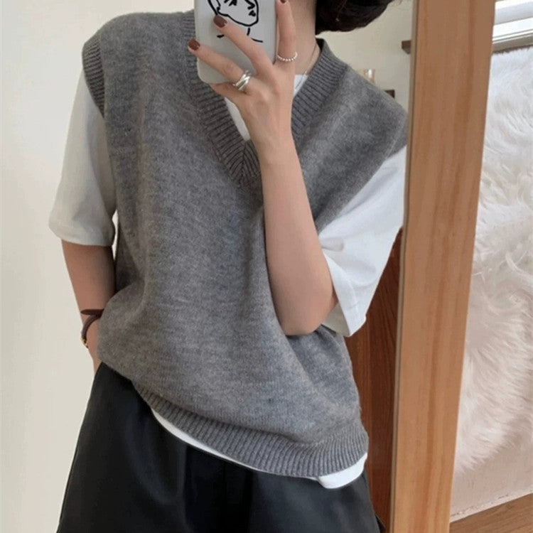 Gilet élégant en maille pour femme, coupe décontractée, col en V et détails raffinés Berg-Feldt