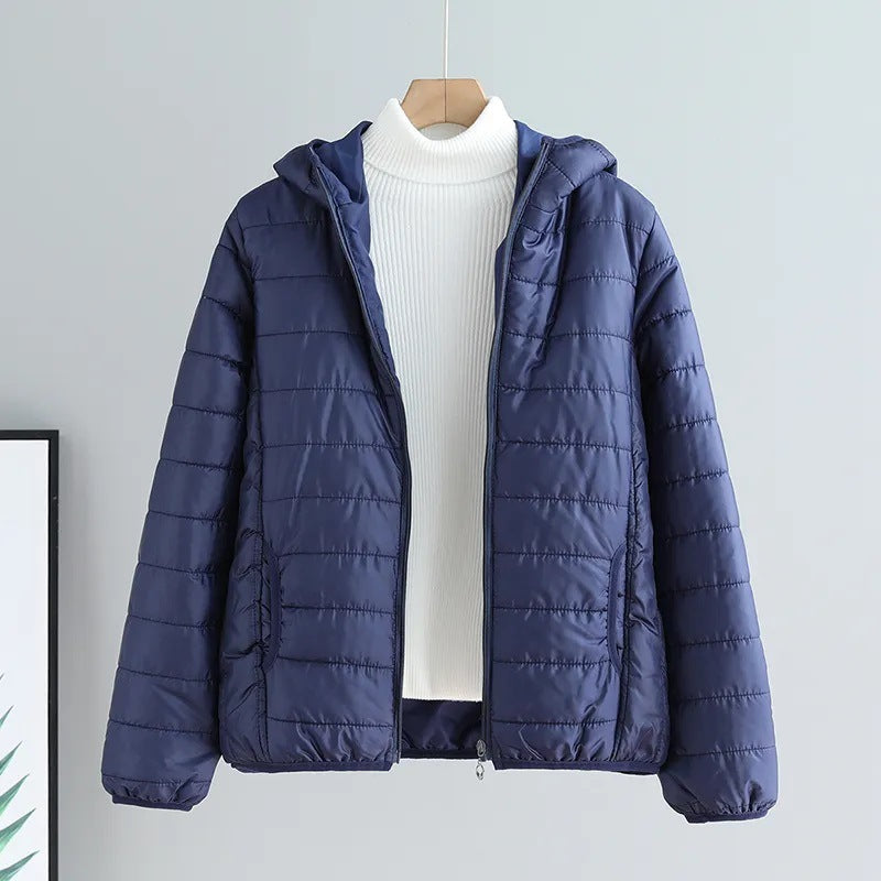 Veste de transition matelassée pour femmes avec poches pratiques et capuche Berg-Feldt