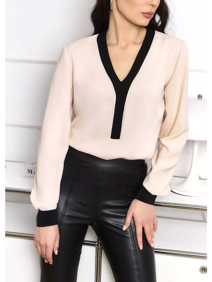 Elegante Damenbluse mit modernen Kontrastdetails von berg-feldt