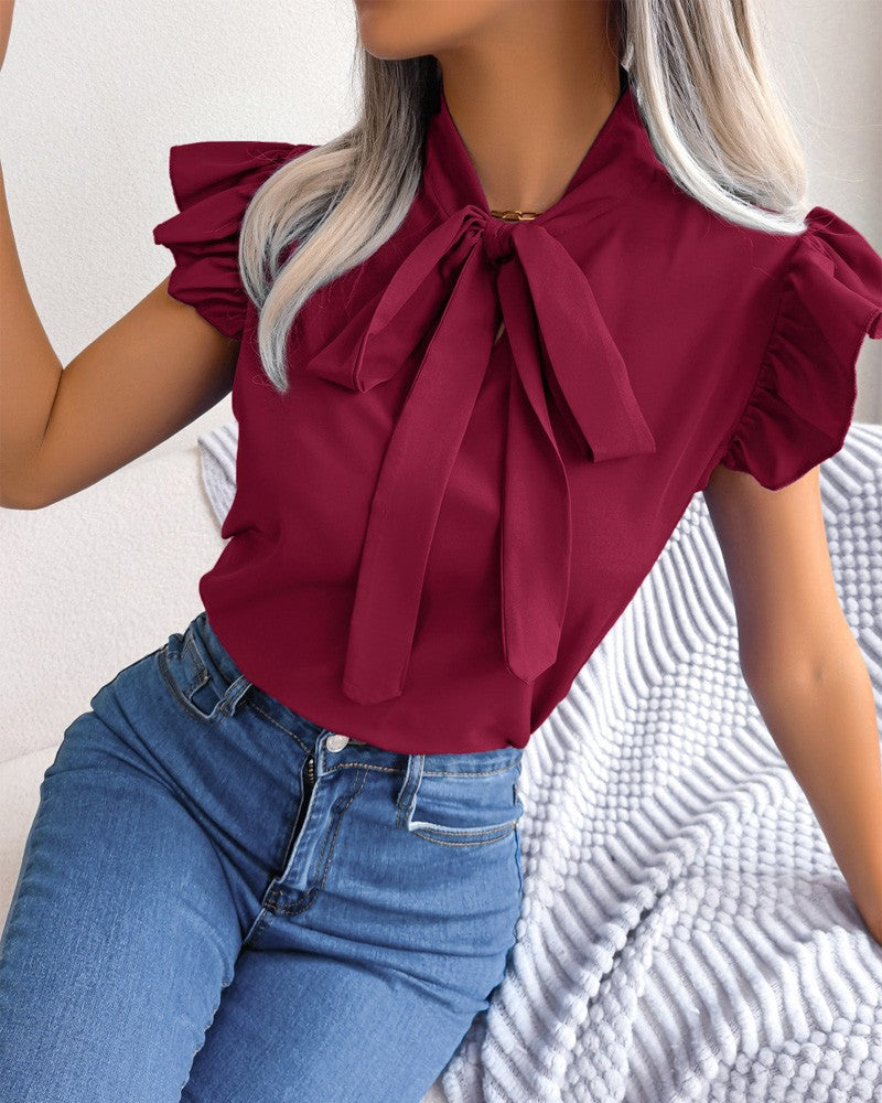 Chemisier femme avec détails froncés et élégant nœud Berg-Feldt