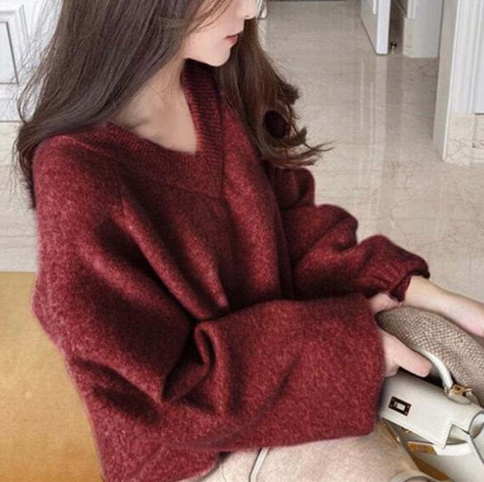 Pull en maille épaisse avec col en V profond et manches volumineuses Berg-Feldt pour femme