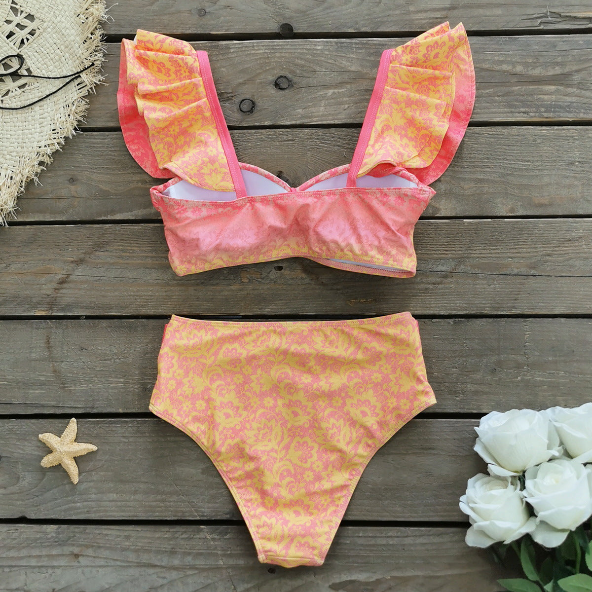 Haut de maillot de bain à manches bouffantes et coupe haute berg-feldt