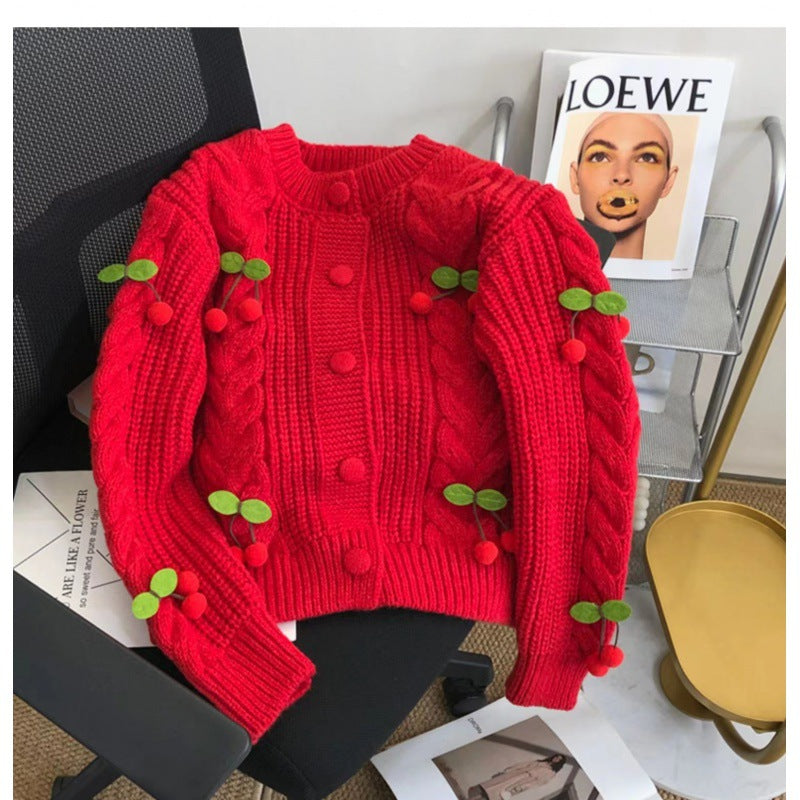 Cardigan en maille avec motif cerises ludique et torsades élégantes Berg-Feldt