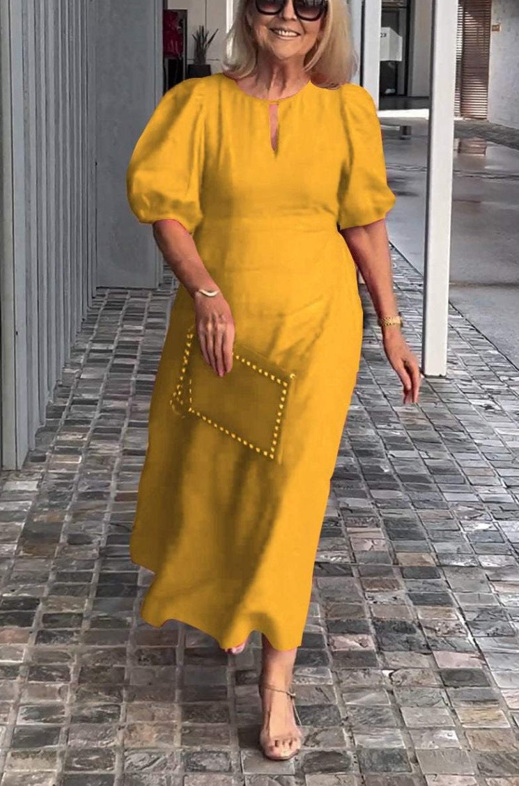 Elegantes Maxikleid für Damen mit Puffärmeln und dekorativem Saum von berg-feldt