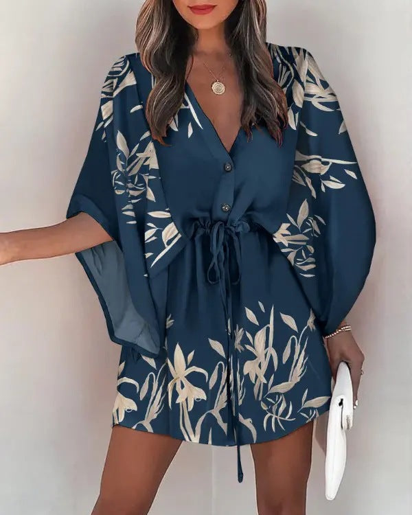 Robe pour femme Berg-Feldt : motif floral et ceinture à la taille