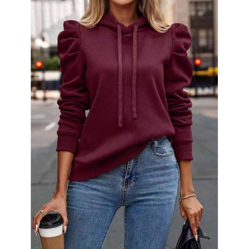 Dames pull à capuche tendance avec manches bouffantes et poches pratiques Berg-Feldt