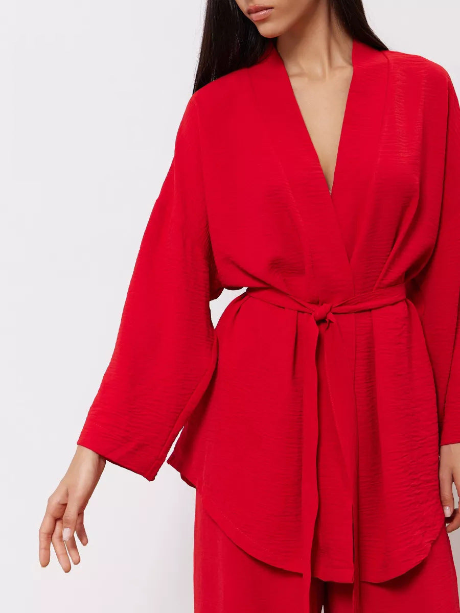 Peignoir élégant de femme style kimono avec ceinture et manches longues de berg-feldt