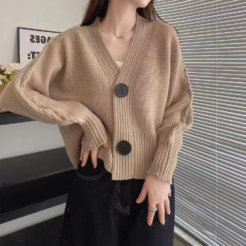 Gilet tendance pour femme avec gros boutons et manches fendues sur les côtés Berg-Feldt
