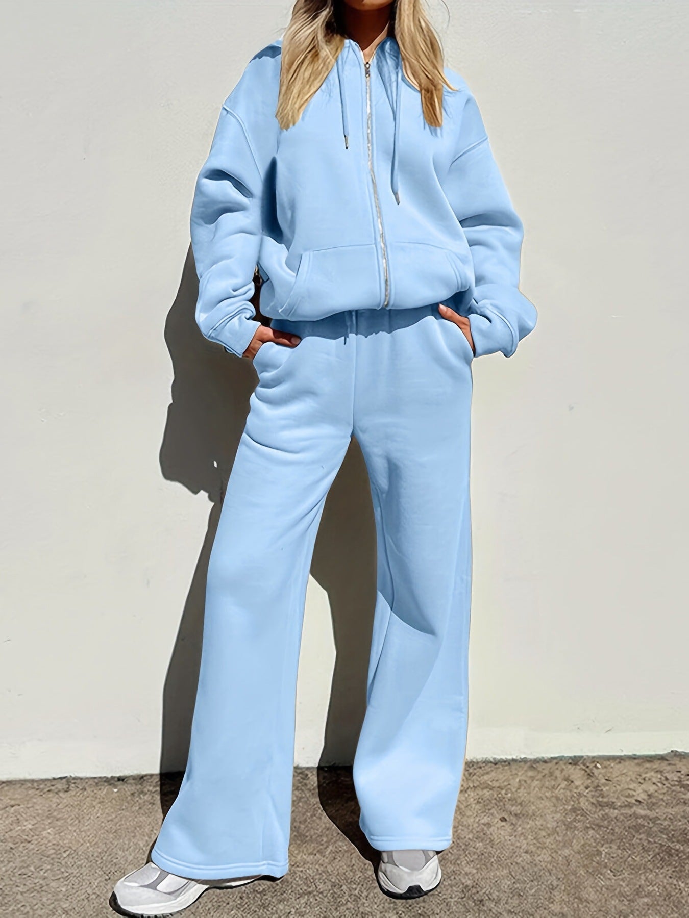 Ensemble de survêtement confortable et élégant pour femme, avec sweat à capuche zippé et pantalon à jambe large Berg-Feldt