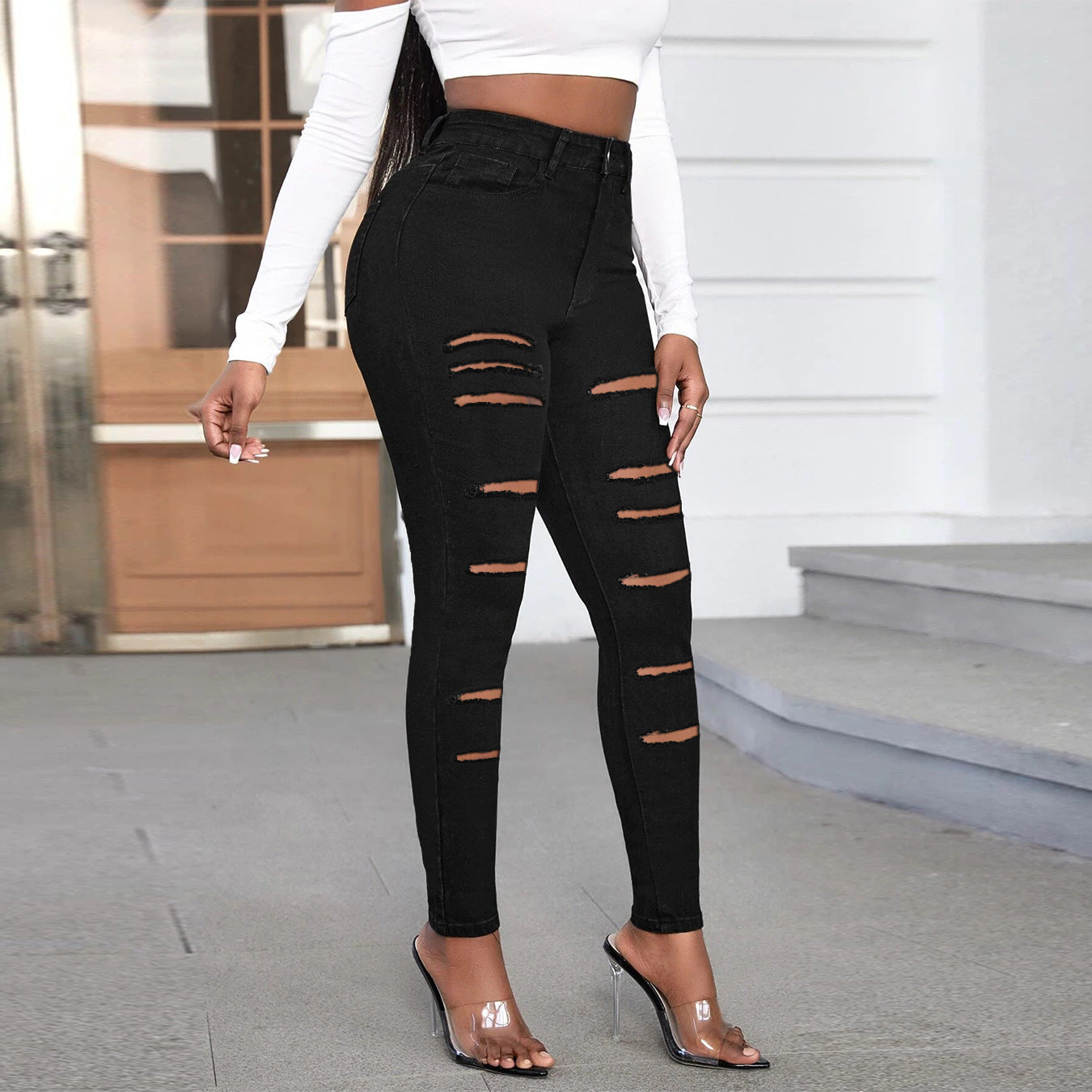 Jean slim taille haute chic pour femme avec découpes tendance de berg-feldt