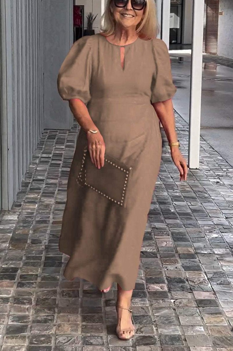 Elegantes Maxikleid für Damen mit Puffärmeln und dekorativem Saum von berg-feldt