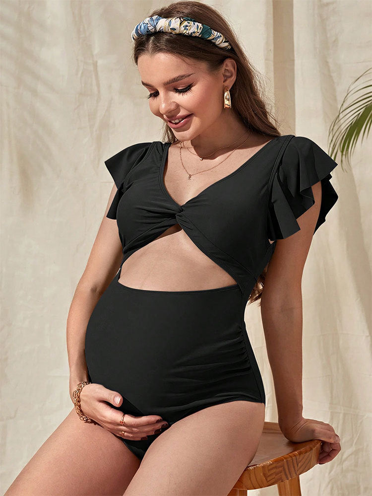 Badeanzug für Damen: unifarben, mit großen Rüschen und modernem Cut-Out (berg-feldt)