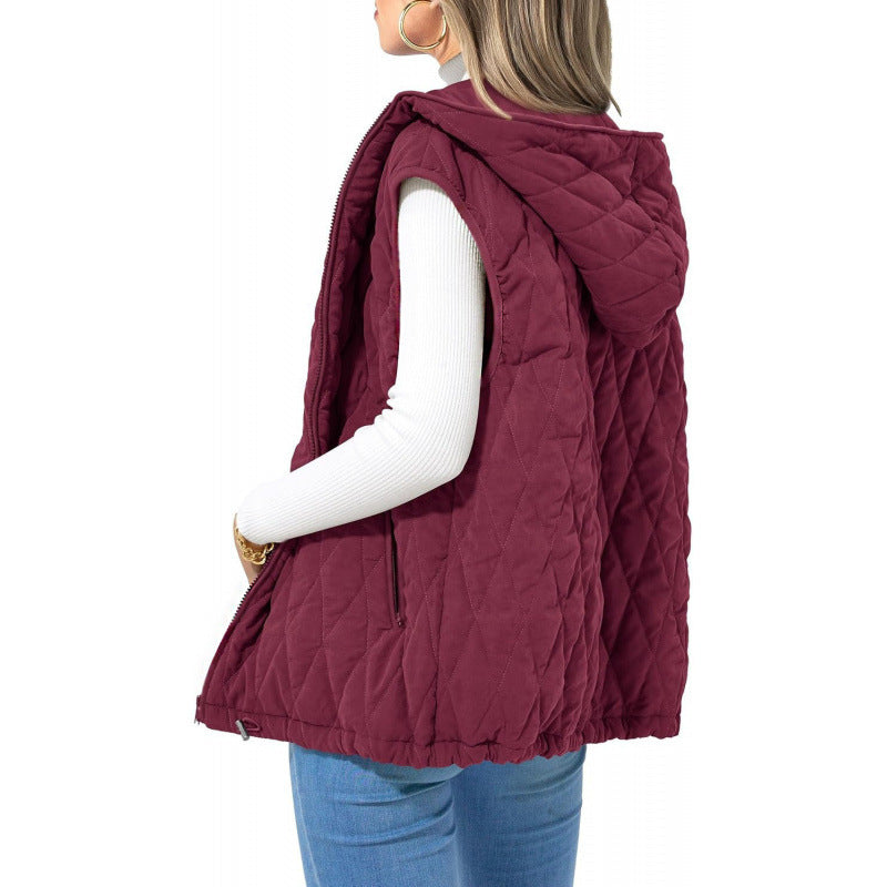 Women's quilted vest with hood and side zip pockets Berg-Feldt