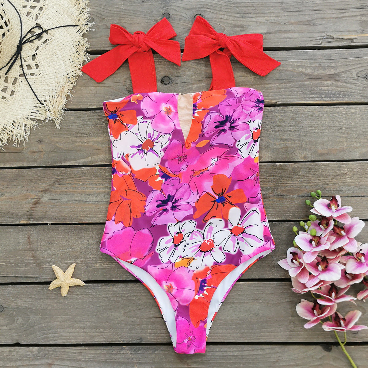 Maillot de bain femme Berg-Feldt : une pièce à nœuds romantiques et motif floral