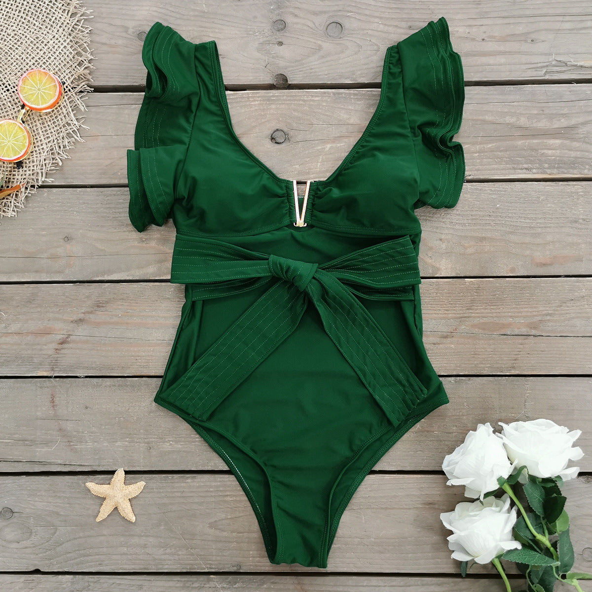 Élégant maillot de bain pour femme avec volants et ceinture, de berg-feldt