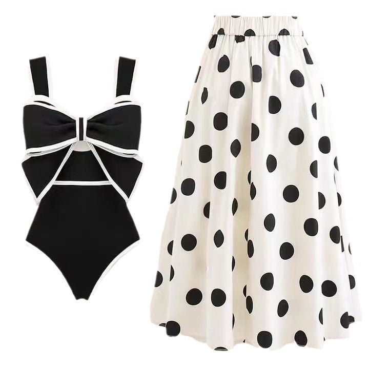 Elegant women's swimsuit and polka-dot maxi skirt set by berg-feldt