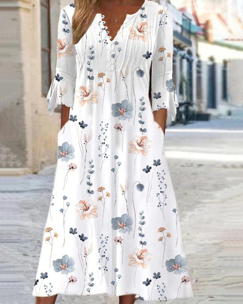 Robe longue fleurie pour femme avec manches longues, boutonnage et fleurs délicates de berg-feldt