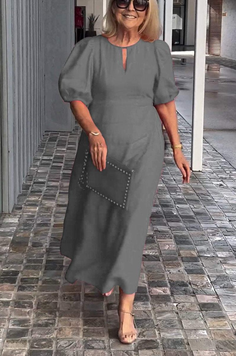 Elegantes Maxikleid für Damen mit Puffärmeln und dekorativem Saum von berg-feldt
