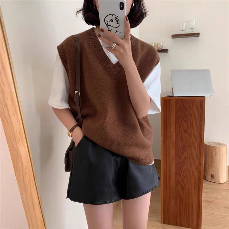 Gilet élégant en maille pour femme, coupe décontractée, col en V et détails raffinés Berg-Feldt
