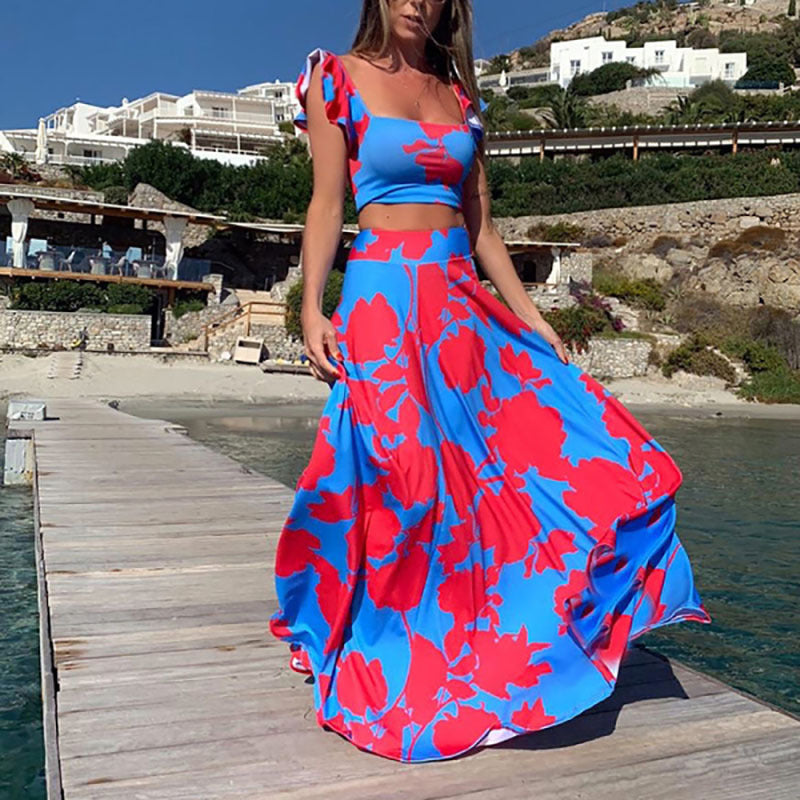 Robe longue élégante pour femme avec ourlet fluide et motif floral ludique Berg-Feldt