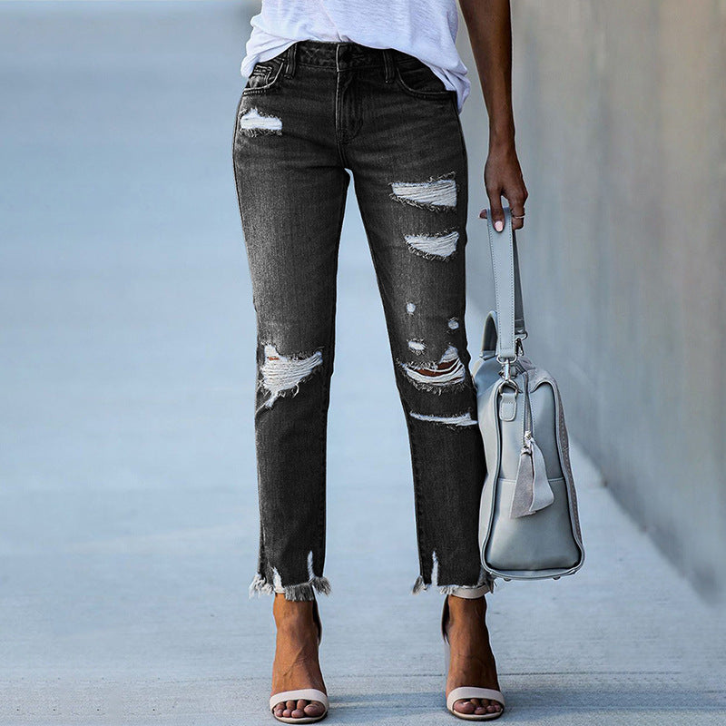 Modische Damen Jeans mit hohem Bund, fransigem Saum und Destroyed-Effekt von berg-feldt