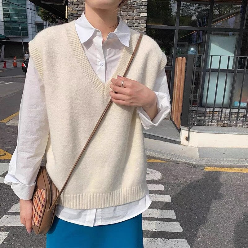 Gilet élégant en maille pour femme, coupe décontractée, col en V et détails raffinés Berg-Feldt