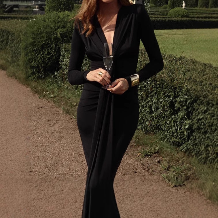 Robe longue élégante à manches longues pour femme avec détail de nœud raffiné et design sculptant Berg-Feldt
