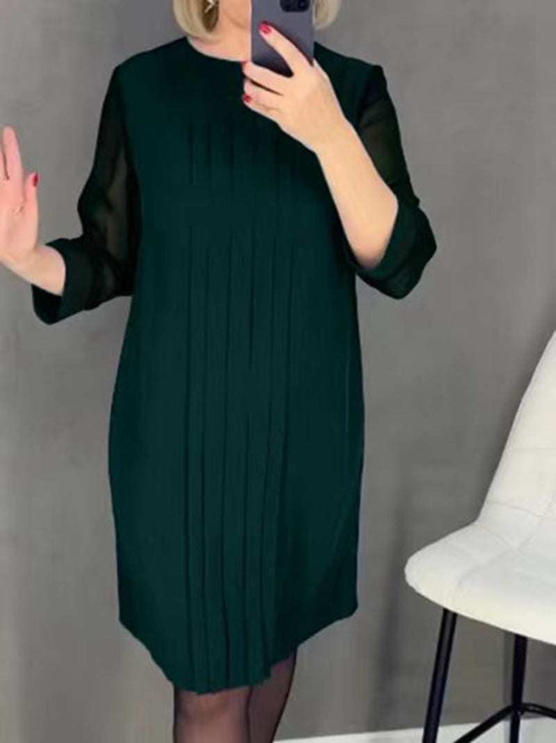 Elegant evening dress for women with pleats, transparent sleeves and a refined cut by berg-feldt