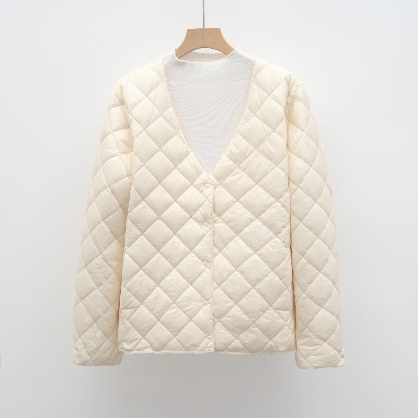 Veste matelassée de mi-saison pour femme avec col en V moderne et fermeture boutonnée Berg-Feldt