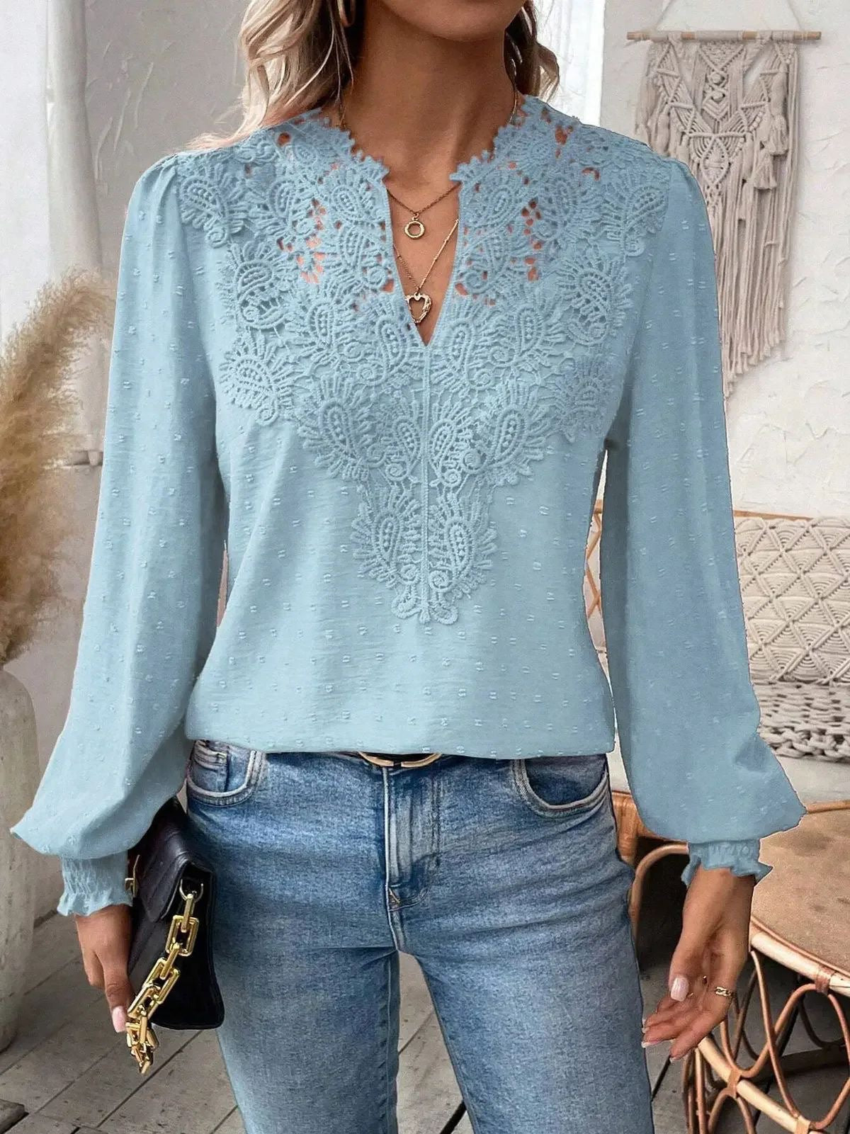 Blouse pour femme avec col en V et manches longues bouffantes par berg-feldt