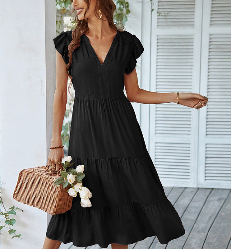 Elegantes Damen-Midi-Kleid mit weiten Rüschenärmeln und V-Ausschnitt von berg-feldt