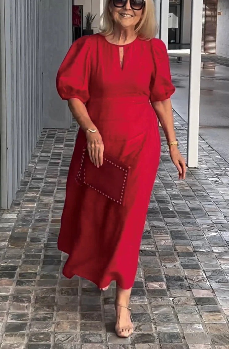 Elegantes Maxikleid für Damen mit Puffärmeln und dekorativem Saum von berg-feldt