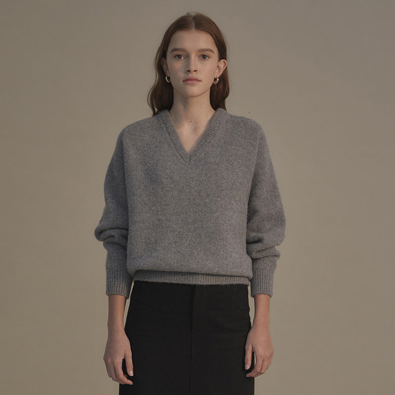 Hochwertiger Damen-Wollpullover mit V-Ausschnitt, lässigem Schnitt und Bündchen von berg-feldt
