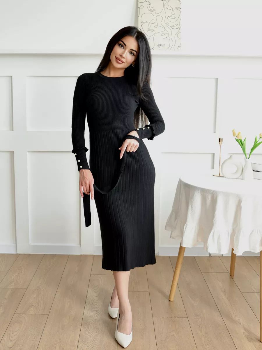 Elegantes Damenstrickkleid mit Rippstruktur und modischen Ärmeldetails von berg-feldt
