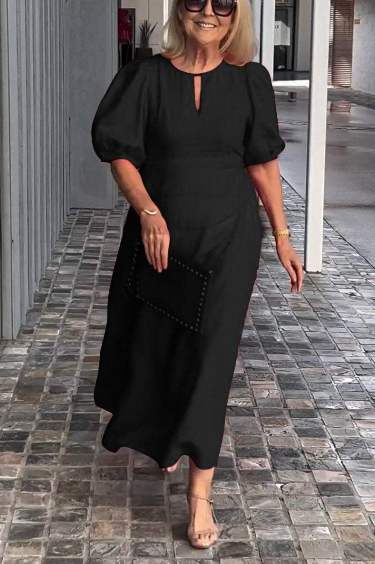 Elegantes Maxikleid für Damen mit Puffärmeln und dekorativem Saum von berg-feldt