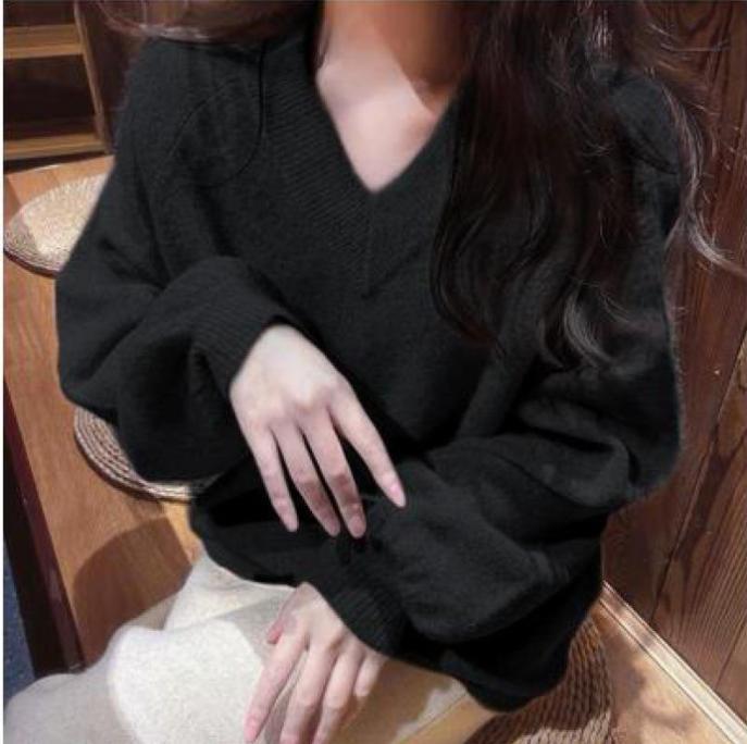 Pull en maille épaisse avec col en V profond et manches volumineuses Berg-Feldt pour femme