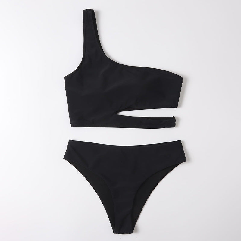 Haut de maillot de bain asymétrique Berg-Feldt pour femme avec découpe raffinée