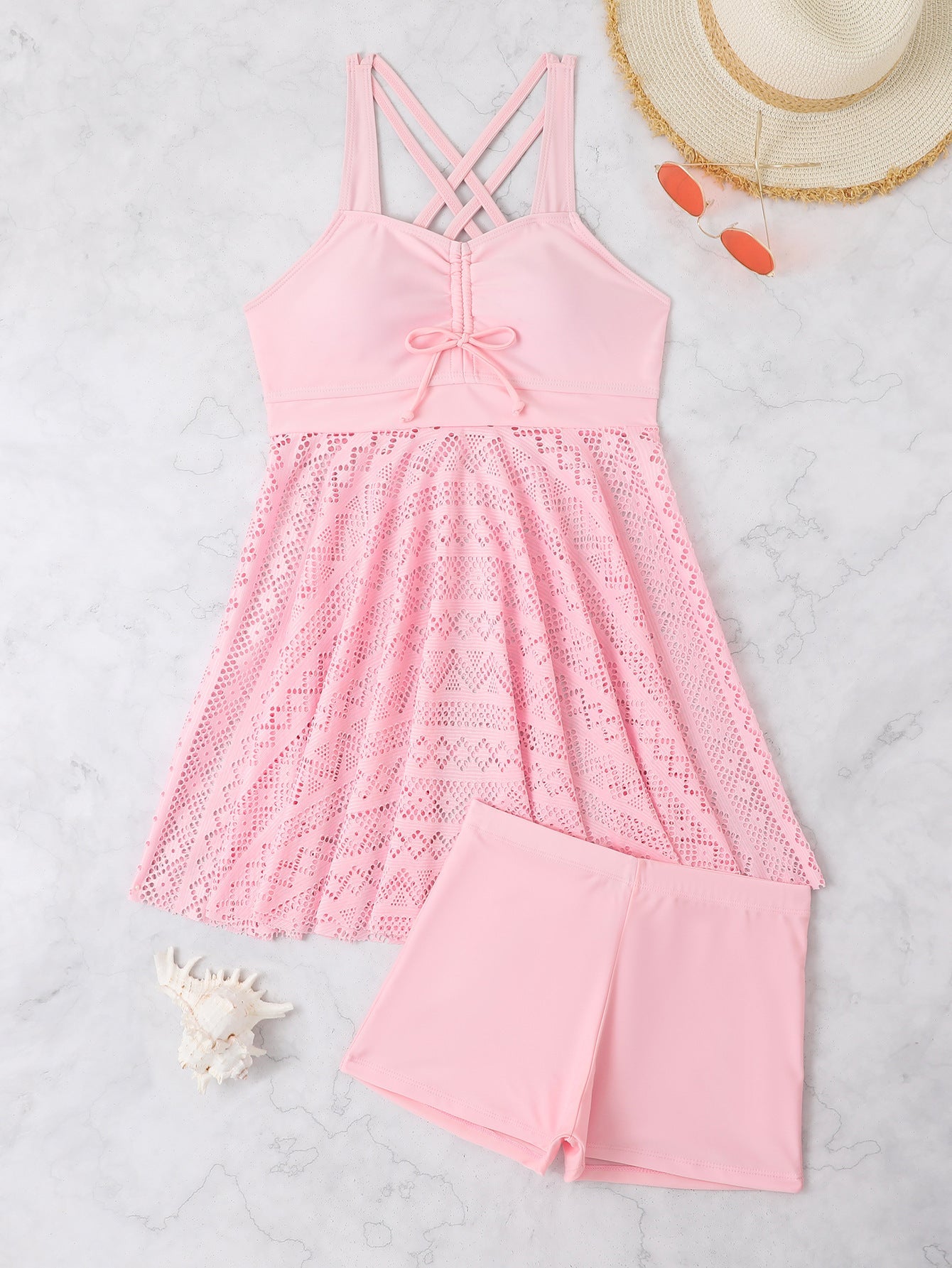 Badekleid für Damen mit verstellbaren Trägern und romantischem Spitzenrock von berg-feldt