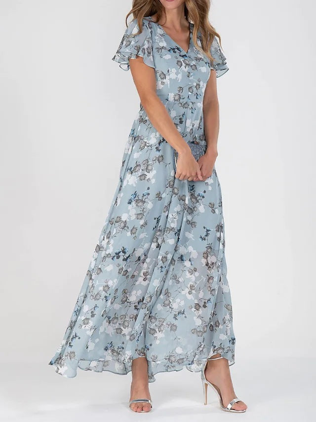 Robe longue élégante pour femme avec manches transparentes et imprimé floral de berg-feldt