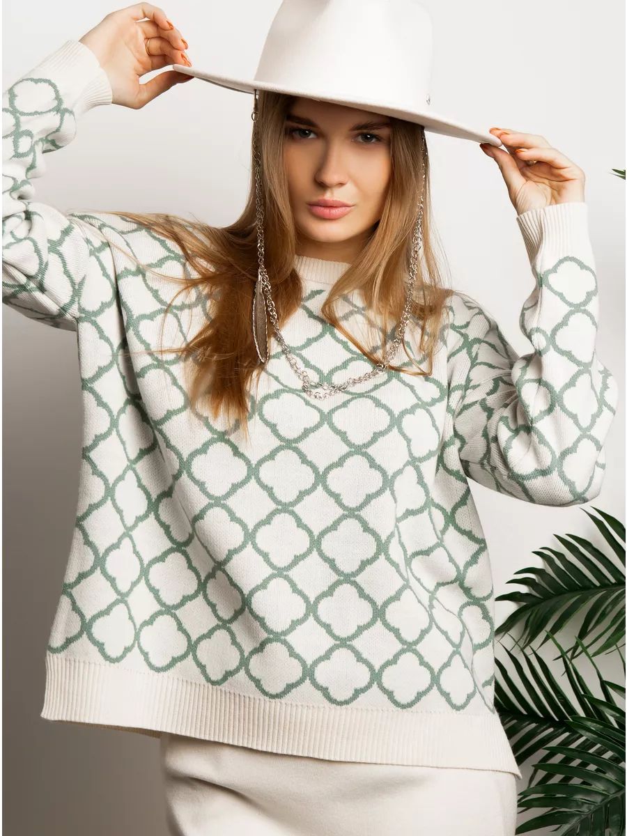 Stylish women's pullover with a fashionable mix of patterns and ribbed cuffs by berg-feldt