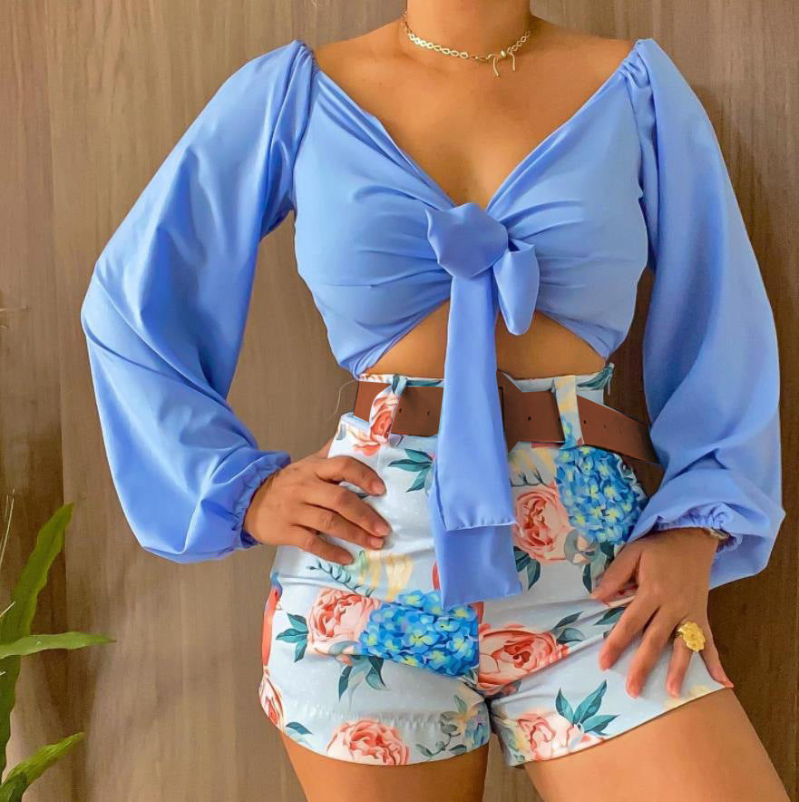 Spielfreudiges Damen-Cropped-Top mit weiten Ärmeln und Knotendetail von berg-feldt