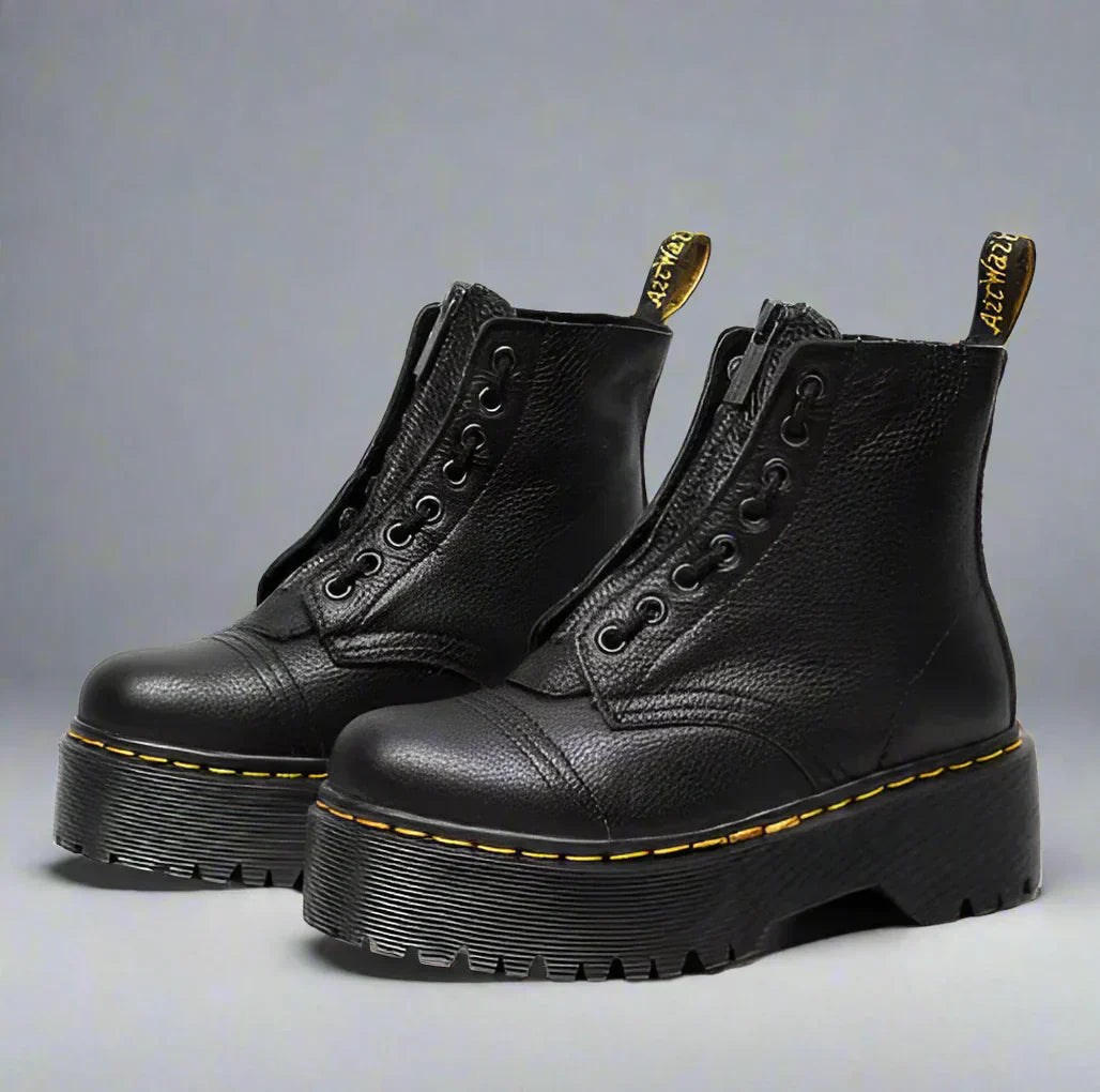 Bottes à lacets Berg-Feldt en cuir : robustes et élégantes en noir
