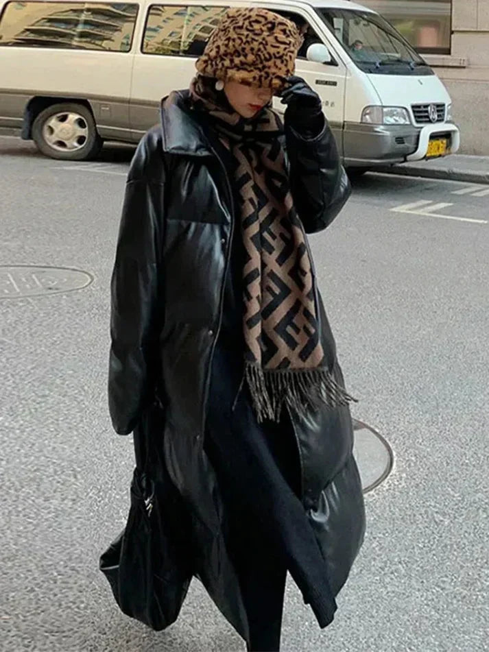 Berg-Feldt | Lange Leder-Pufferjacke mit Gürtel